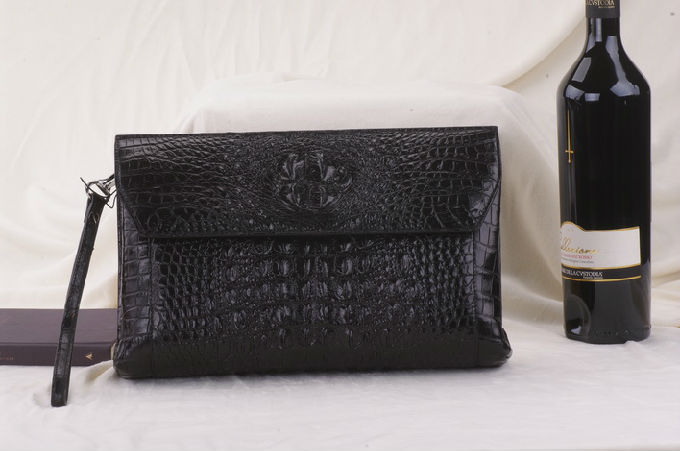 思喏登鱷魚皮具男手包一